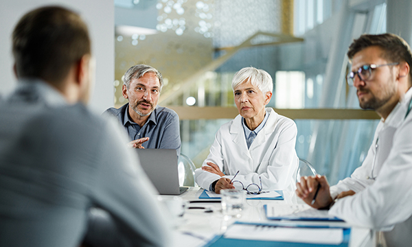 A group of four people in deep conversations